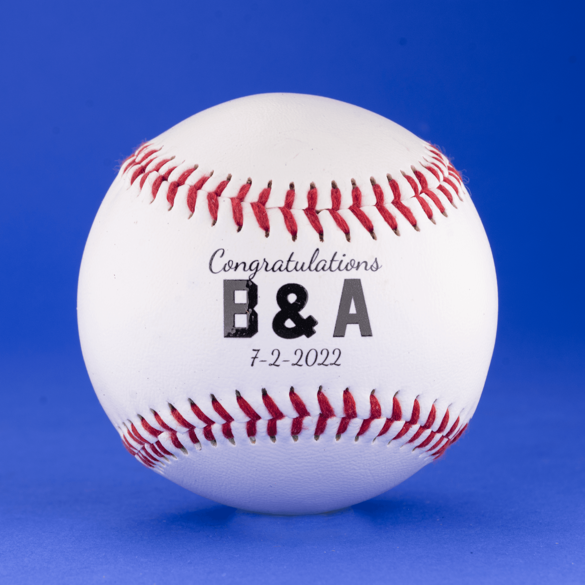 Printed Baseball with Text Between the Laces