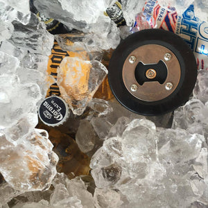 Hockey Puck Opener in Ice Chest